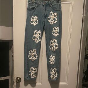 Women's Blue Jeans with White Floral Design